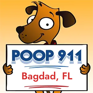 POOP 911 Bagdad, Florida yard sign being held by a Smiling Brown Dog.