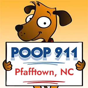 POOP 911 Pfafftown, North Carolina yard sign being held by a Smiling Brown Dog.